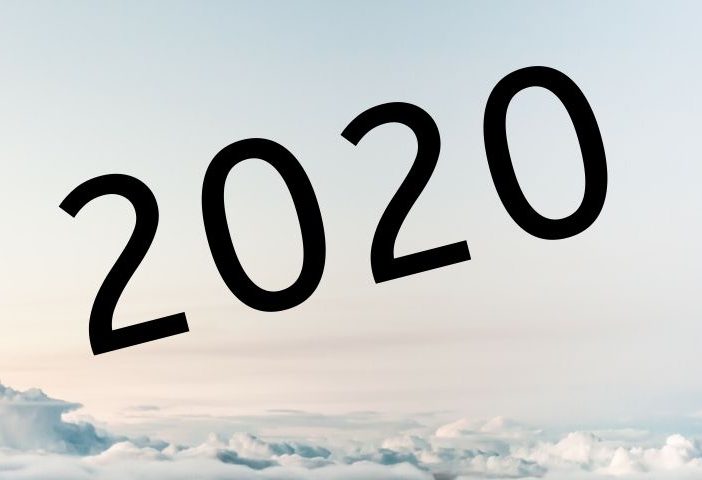 2020 floating in cloudy sky